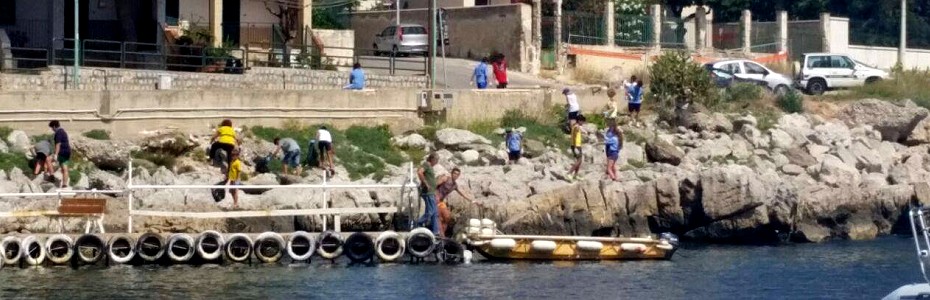 I sub e gli scout ripuliscono i fondali e la scogliera di Isola