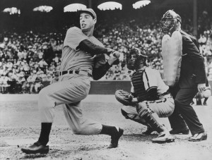 American baseball player Joe DiMaggio (1914 - 1999) hits out. Original Publication: People Disc - HC0062 (Photo by Keystone/Getty Images)